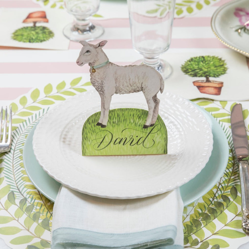 A Little Lamb Place Card by Hester &amp; Cook sets the sheep-themed Easter table setting.