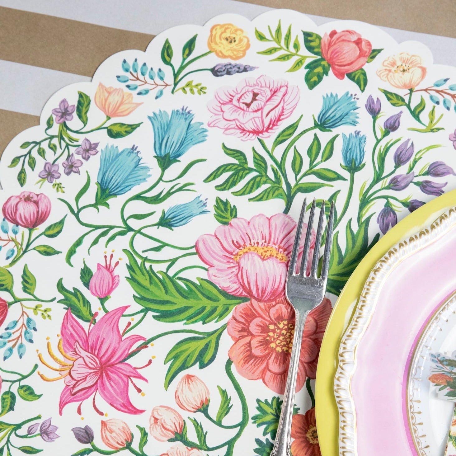A Die-cut Sweet Garden Posey Placemat with colorful blooms by Hester &amp; Cook.