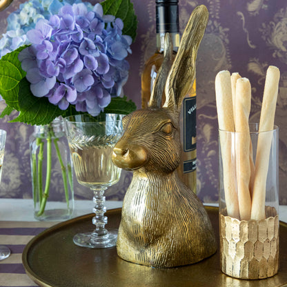 A whimsical Hare Platter in gold bunny head design on a bronze tray, by Accent Decor.