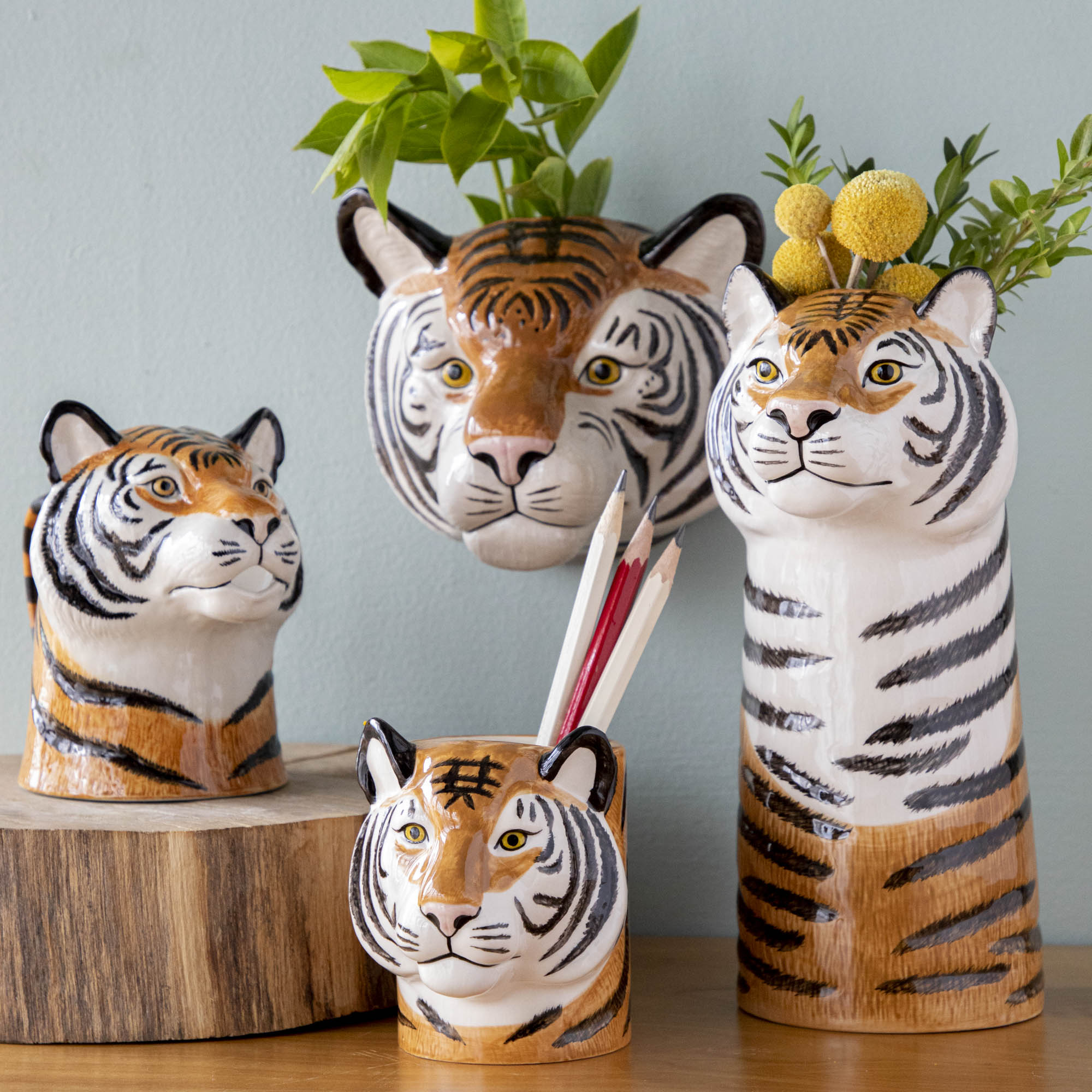 A set of Tiger Ceramic vases by Quail, displayed on a table.