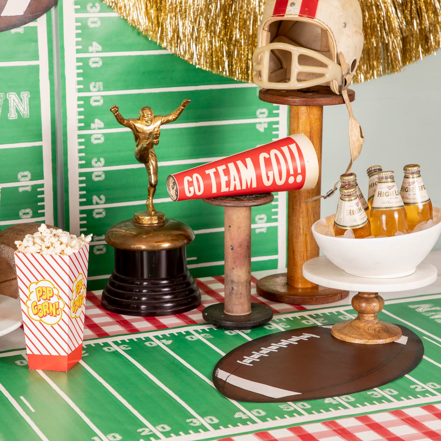 The Touchdown Runner used as a wall paper and table runner for a game day spread.