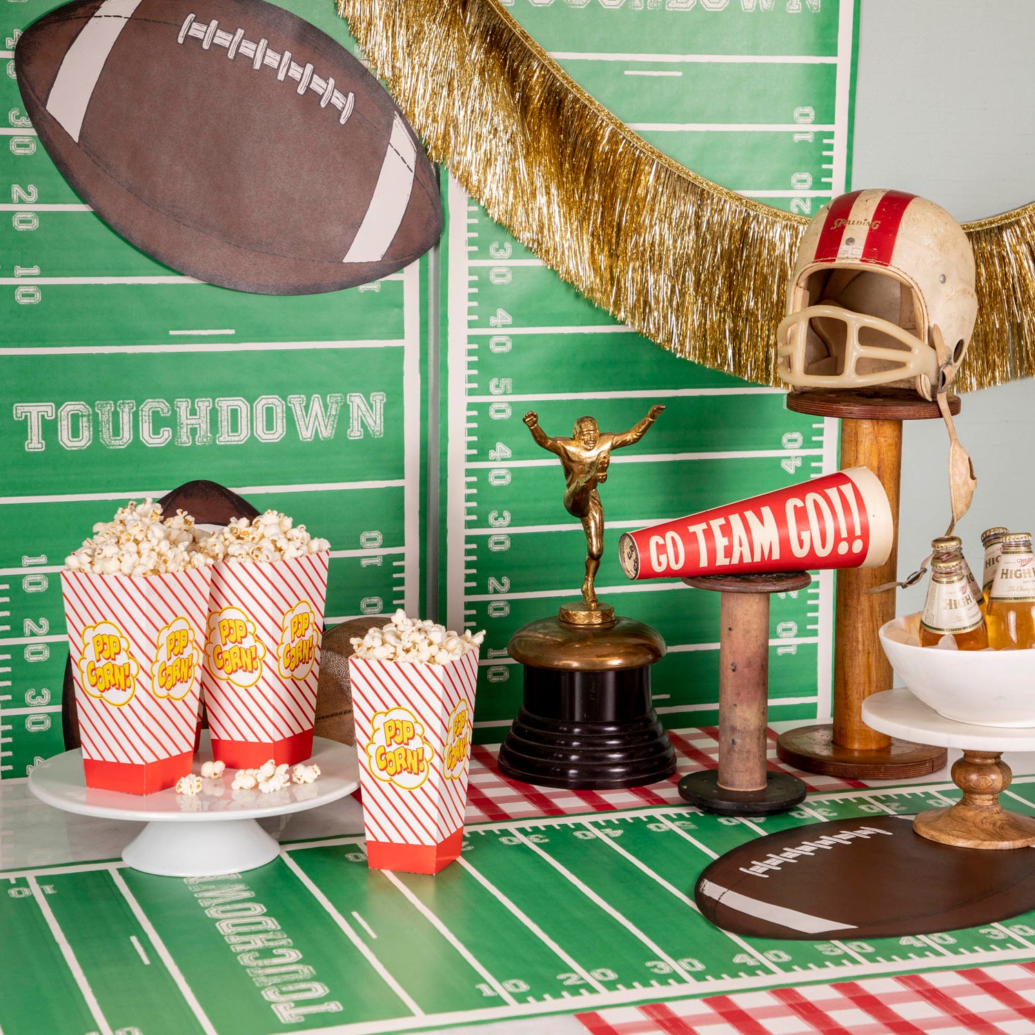 A football themed party with Hester &amp; Cook Die-cut Football Placemats and other snacks.