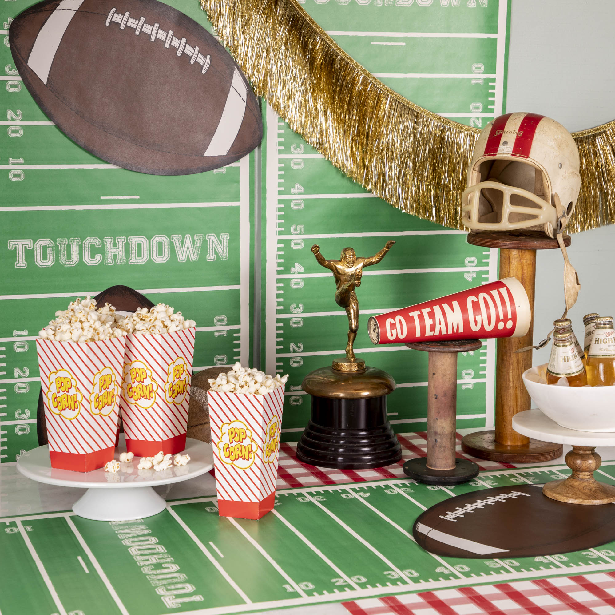 A football themed party with Hester &amp; Cook Die-cut Football Placemats and other snacks.
