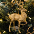 Gold Glittered Deer Ornament in a tree