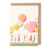 A Balloon Party Greeting Card illustrated by Laura Stoddart with people holding balloons from Hester & Cook.