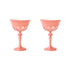 A set of four Rialto Salmon Glasses by SIR/MADAM on a white surface.