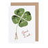 A Hester & Cook Good Luck Lady Greeting Card featuring a clover leaf and the words "good luck," crafted from environmentally sustainable materials.