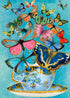 A vibrant digital art piece featuring a variety of colorful, hand-glittered Madame Treacle Butterflies Glittered Greeting Cards emerging from a vintage teacup against a teal background.