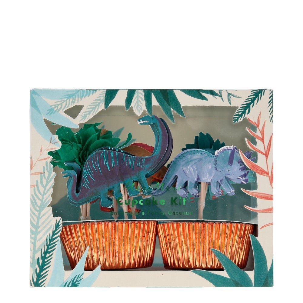 A Dinosaur Kingdom Cupcake Kit in a box with toppers by Meri Meri.