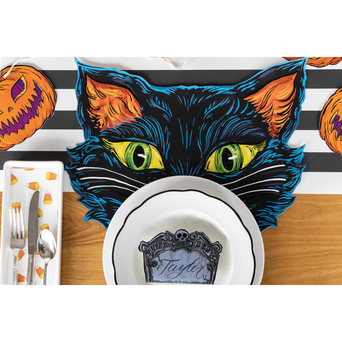 The Die-cut Black Cat Placemat under a spooky Halloween place setting, from above.
