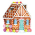 An illustrated die-cut gingerbread house in rich brown with white icing, decorated with colorful candies and a seafoam green door.