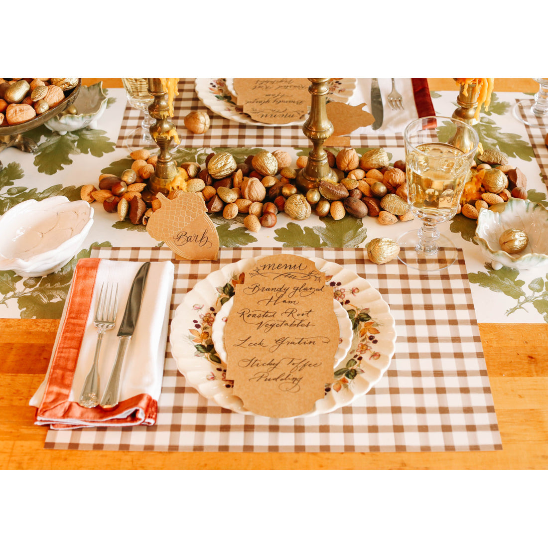 The Brown Painted Check Placemat under an elegant fall table setting. 