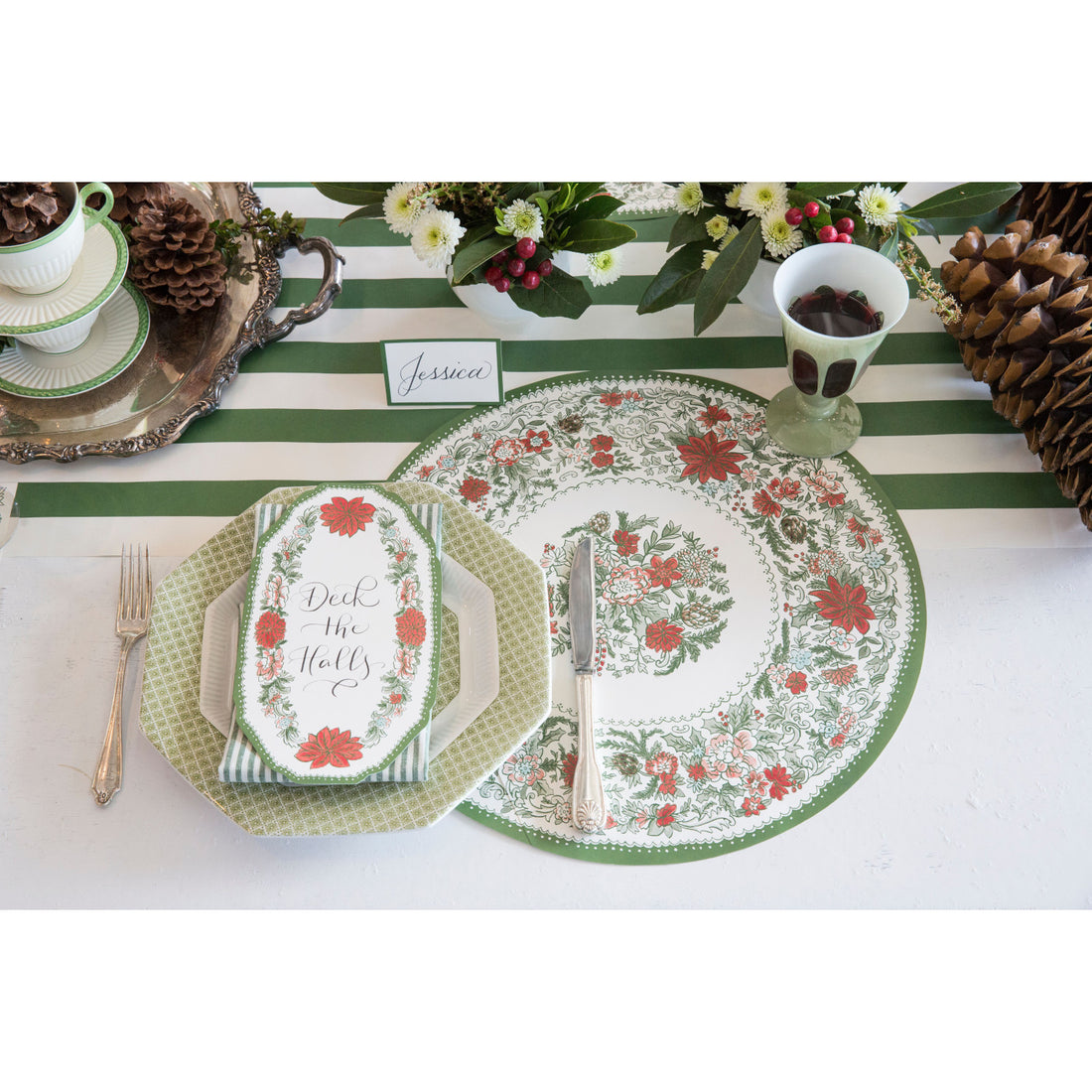 The Die-cut Christmas China Placemat under a festive Christmas place setting.