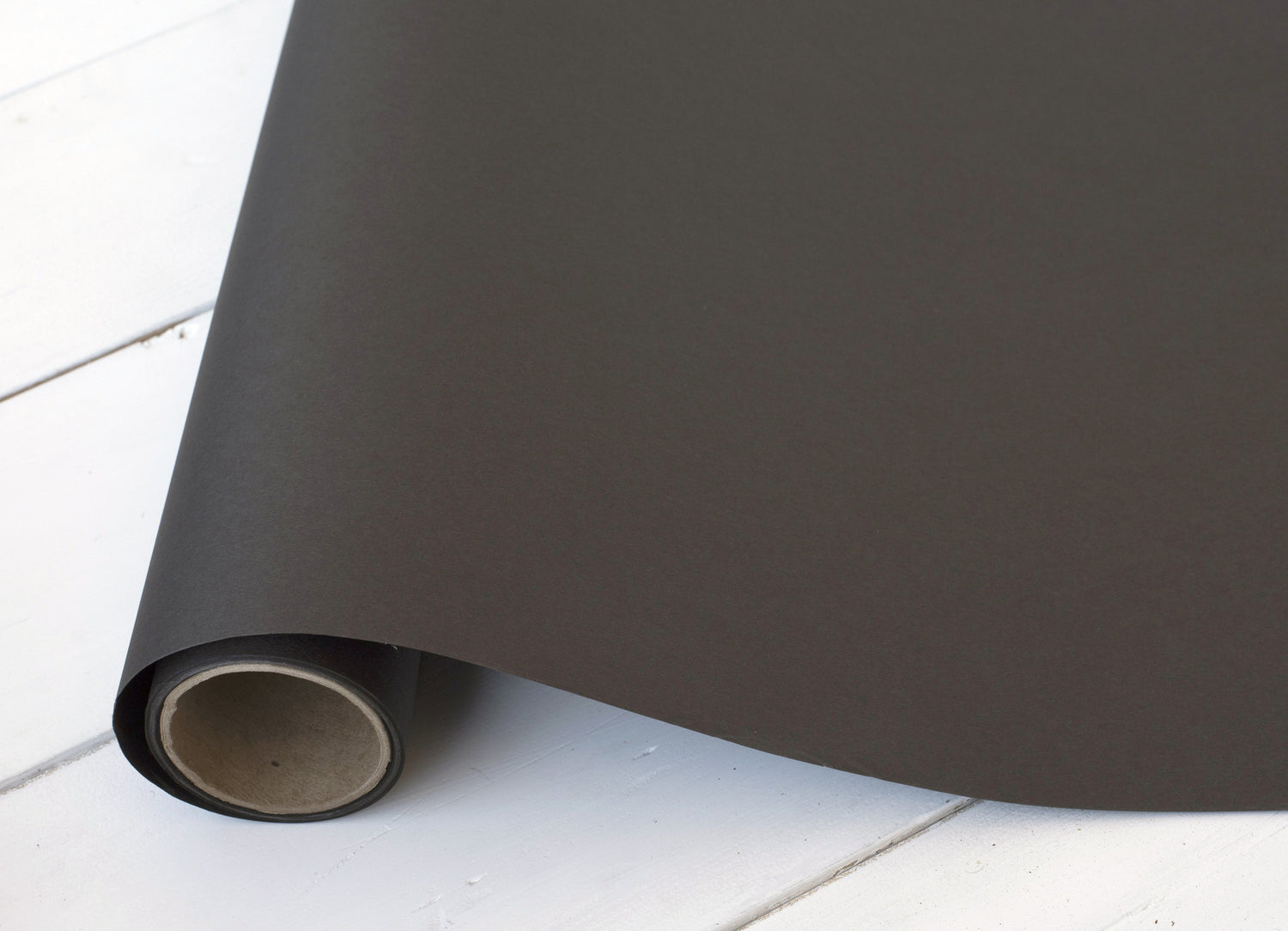 Close-up of the Chalkboard Runner paper roll, showing solid black paper.