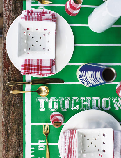 The Touchdown Runner under a sports-themed table setting, from above.