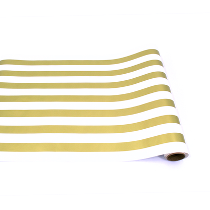 A Gold Classic Stripe Runner by Hester &amp; Cook on a white surface, perfect for entertaining.