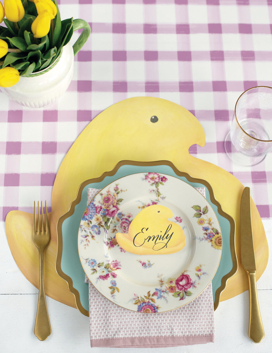 The Die-cut PEEPS® Chick Placemat under an Easter place setting.
