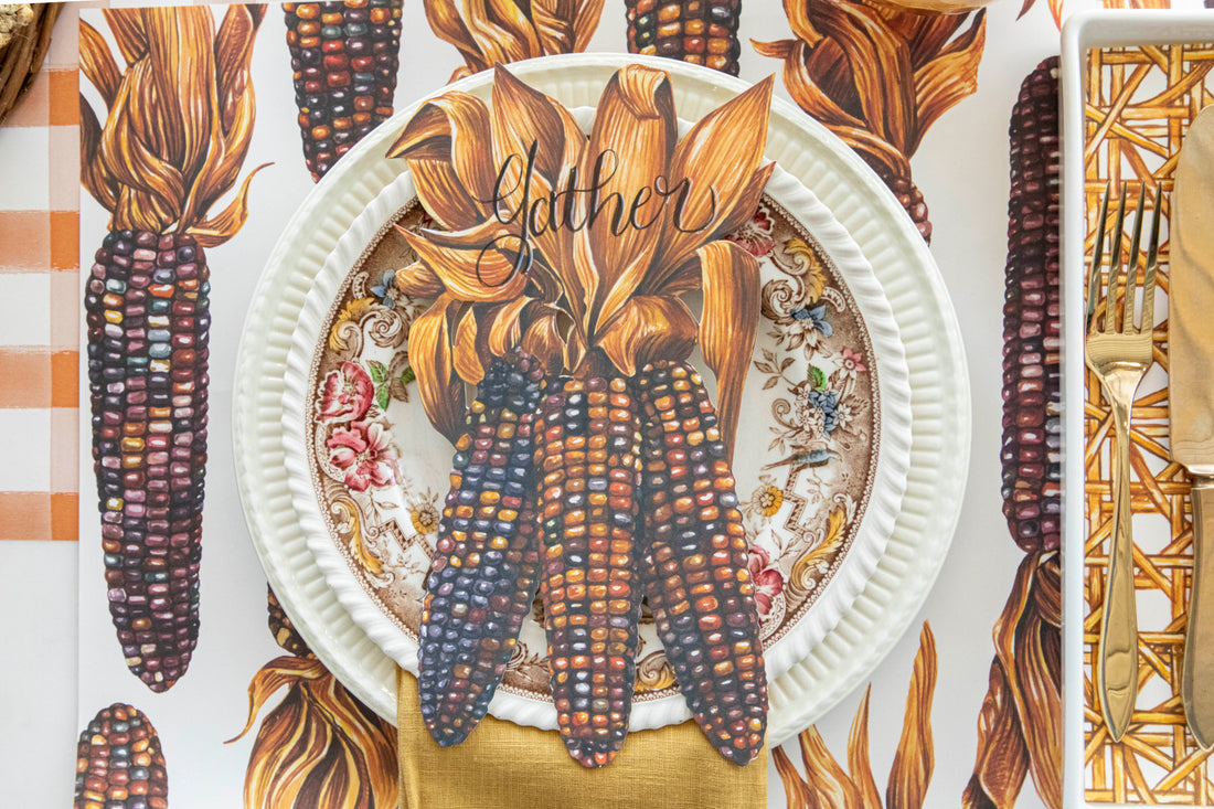 Illustration of colorful Hester &amp; Cook Maize Table Accent with husks as a fall table accent.