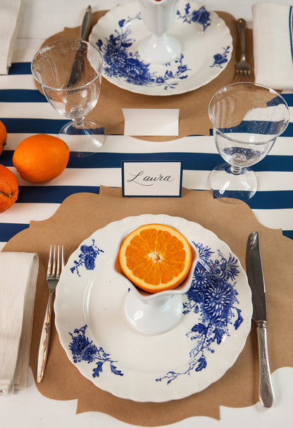A Navy Classic Stripe Runner tablecloth from Hester &amp; Cook, perfect for entertaining or as a gift wrapping alternative.