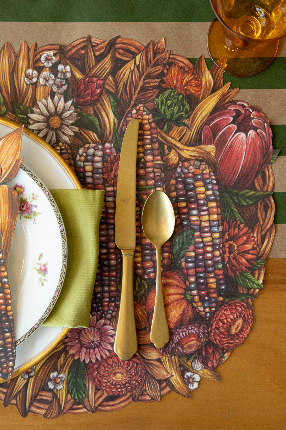 The Die-cut Gathering Basket Placemat under an elegant fall-themed place setting, from above.