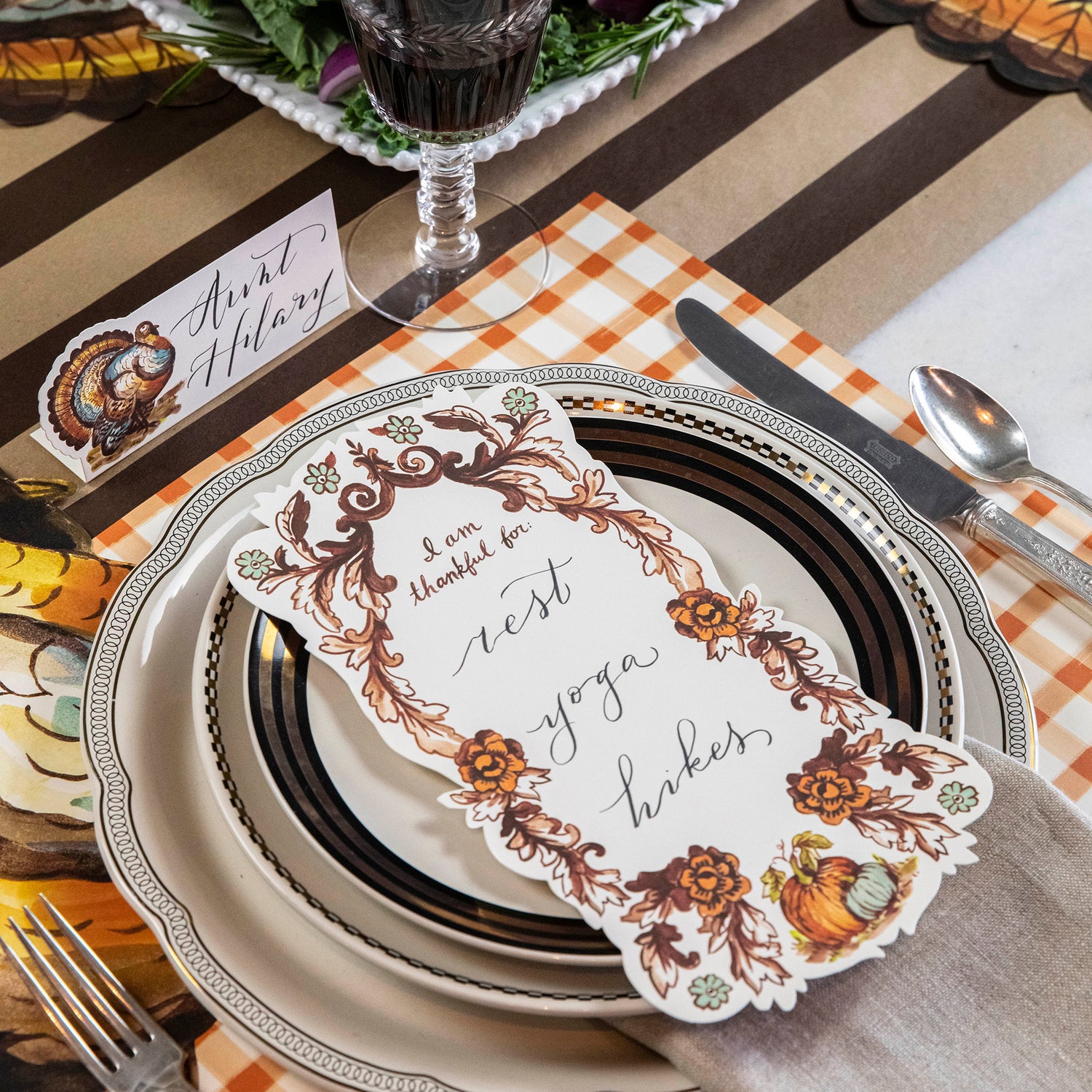 An &quot;I Am Thankful For&quot; Table Accent by Hester &amp; Cook displayed on a plate, serving as a beautiful table accent.