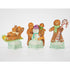 A group of Hester & Cook Gingerbread Table Ornaments centerpiece.