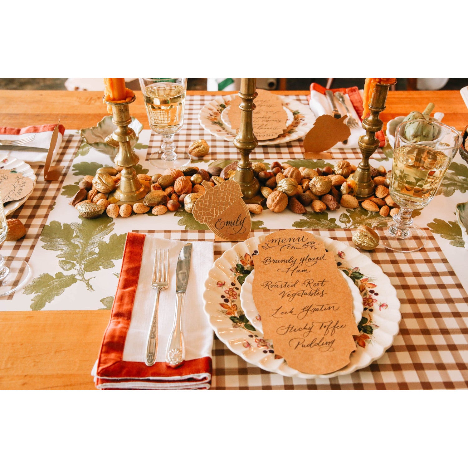 An elegant fall-themed table setting with Acorn Place Cards behind each plate.
