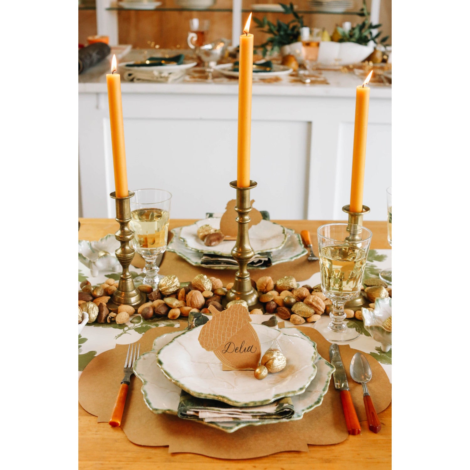 An elegant fall-themed table setting with Acorn Place Cards on the plates.