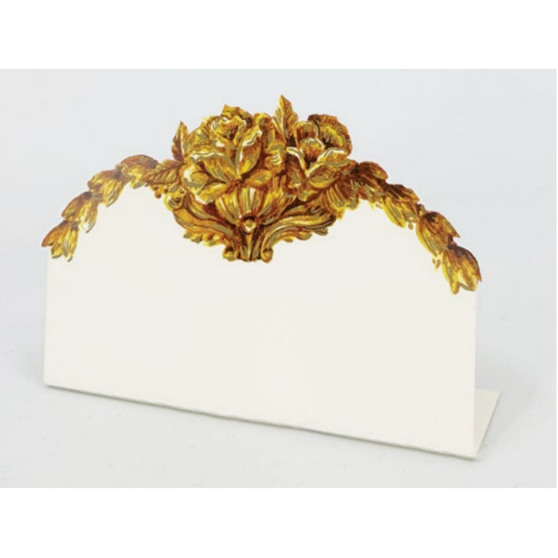 A white, die-cut freestanding place card featuring an ornate gold floral embellishment across the top edge.