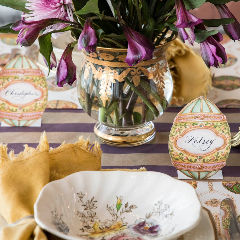 A table setting with Exquisite Egg place cards by Hester &amp; Cook, perfect for labeling dishes or providing a writing space for guests.