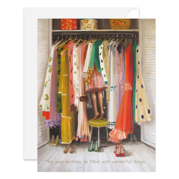 A festive May Your Birthday Be Filled With Wonderful Things greeting card featuring Janet Hill artwork, beautifully showcasing clothes hanging in a closet. Made with high-quality recycled card stock for an eco-friendly touch.