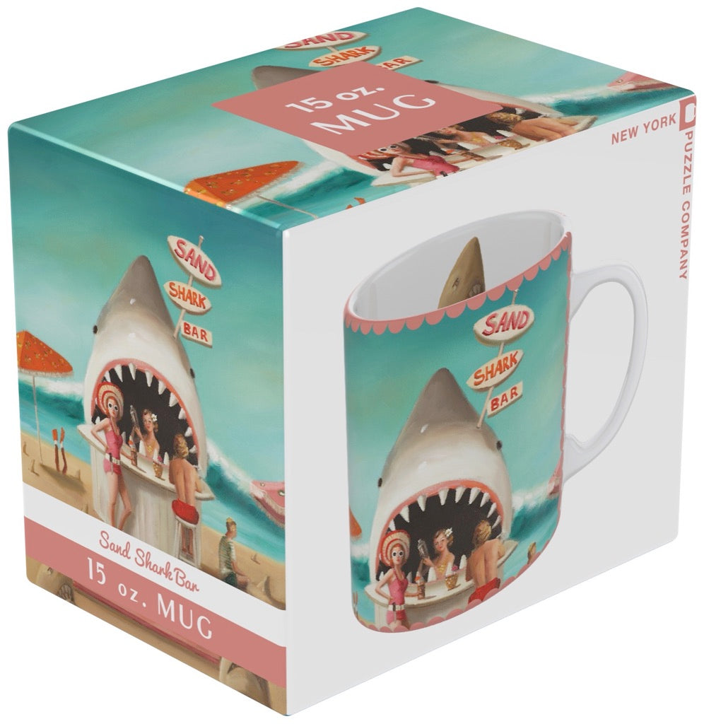 A New York Puzzle Company Shark Bar Mug with an image of a shark in the box.
