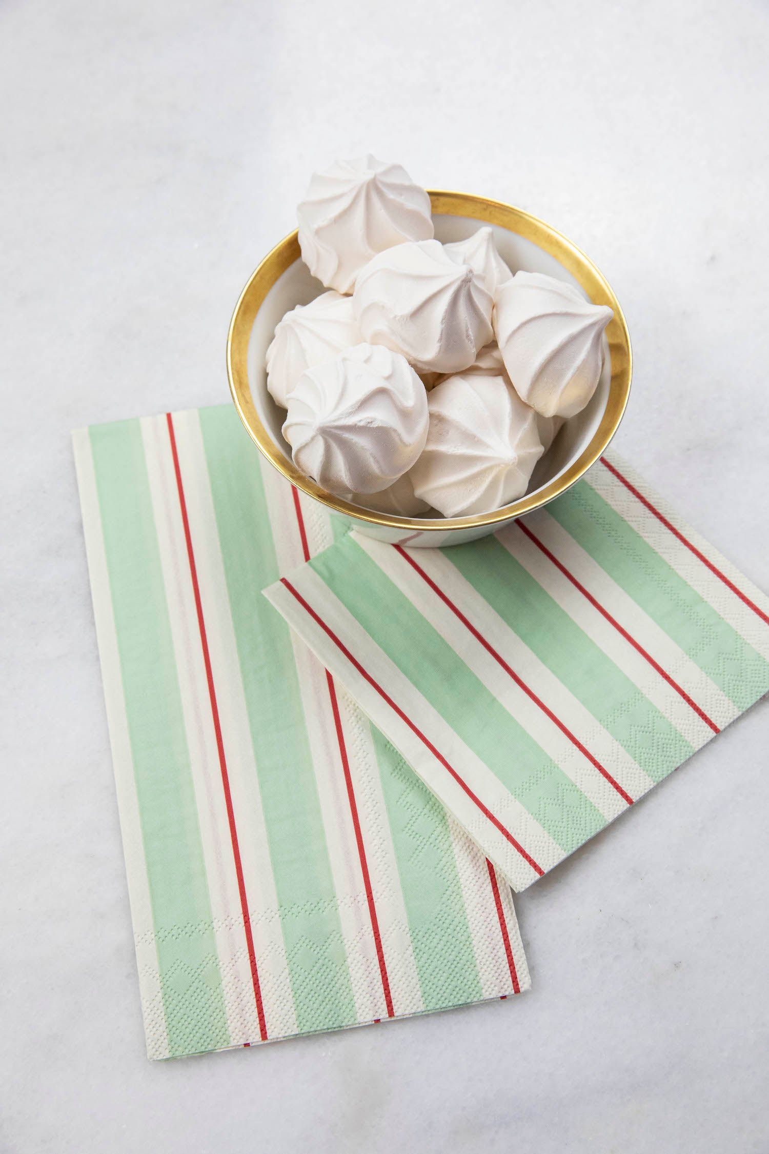 Seafoam &amp; Red Awning Stripe napkins with white meringue on top, perfect for a festive party table setting. (Hester &amp; Cook)