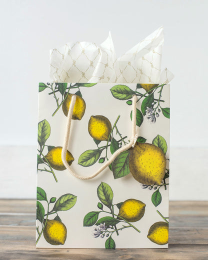 A Hester &amp; Cook Lemon Gift Tag with lemons and leaves on it, adorned with a ribbon design.