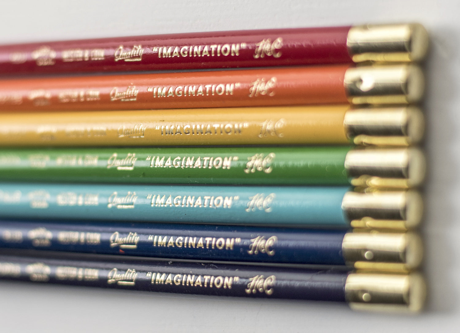 Close up of the end of a set of color pencils. 