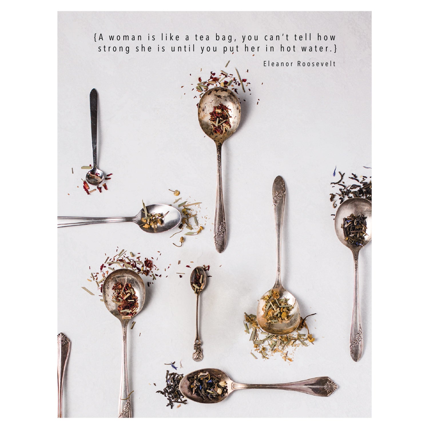 A top-down photo of several silver spoons overflowing with different mixes of tea leaves resting on a white table, with &quot;{A woman is like a tea bag, you can&
