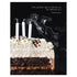 A close-up photo of a slice of white-frosted chocolate cake with three smokey, freshly blown-out candles on a black background, with "{The golden age is before us, not behind us.} Shakespeare" printed in white at the top of the card.