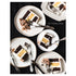 A top-down photo of several white plates with partially eaten slices of layered cake on a black background, with "{oh happy day}" printed in white between plates. 