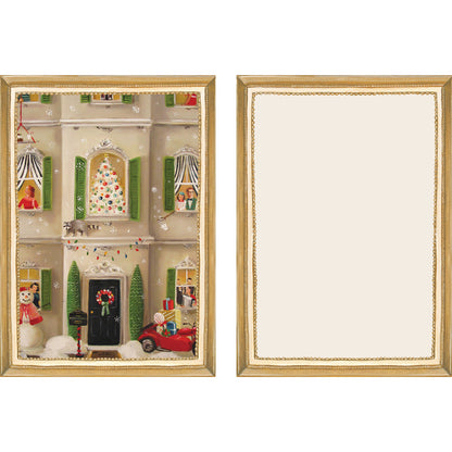 The illustrated front and blank back of a Flat Note, both sides framed in gold, featuring a painterly illustration of a townhome facade where scenes of Christmas festivity can be seen through the windows. 