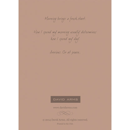 The beige back side of the greeting card, featuring a quote from artist David Arms.