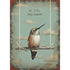 An illustration of a hummingbird resting on a twig held aloft by two white strings over a teal blue sky background with clouds, "BE STILL AND KNOW" printed above the bird.