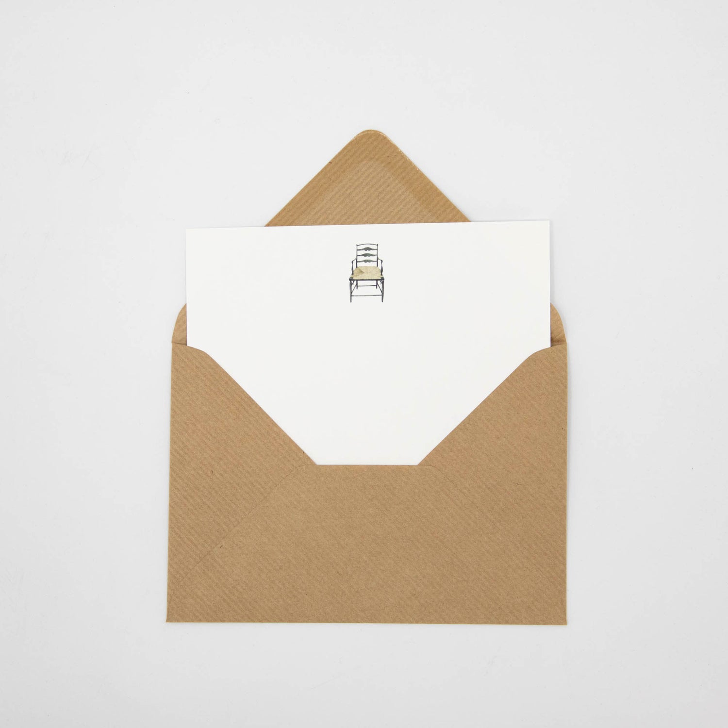 An environmentally responsible Musical Chairs Flat Notes envelope with a yellow ladder on it by Hester &amp; Cook.
