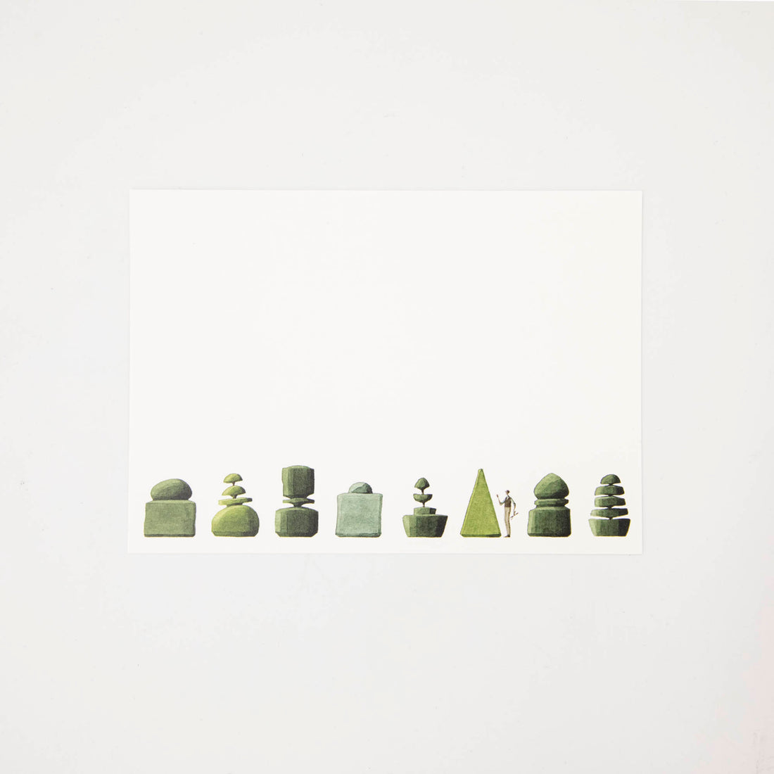 A white notecard featuring illustrations of whimsical topiary shrubs along the bottom edge, with a small man holding clippers standing between two shrubs. 