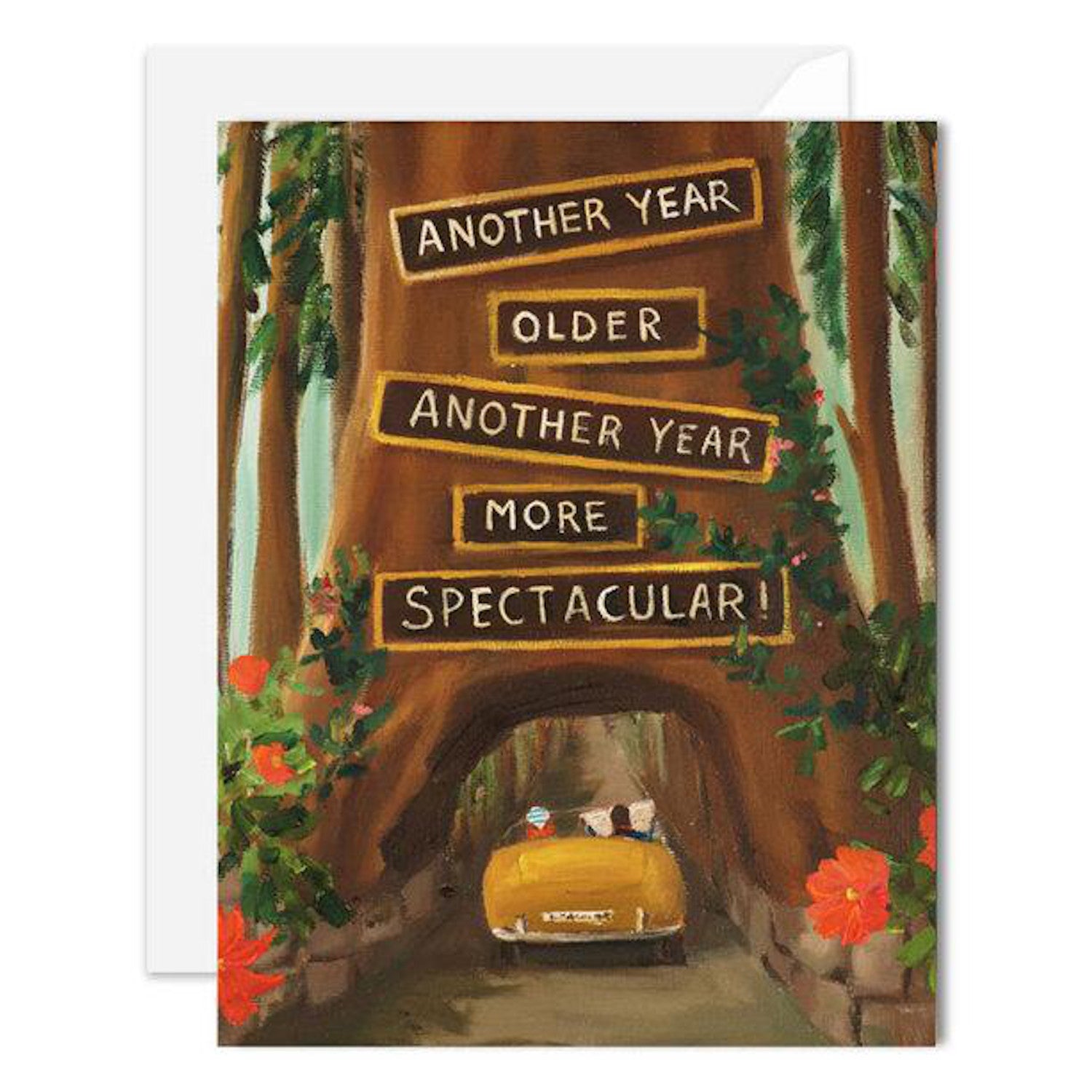 A Redwood Birthday Greeting Card featuring a car driving through a tree, created by Janet Hill on recycled card stock.