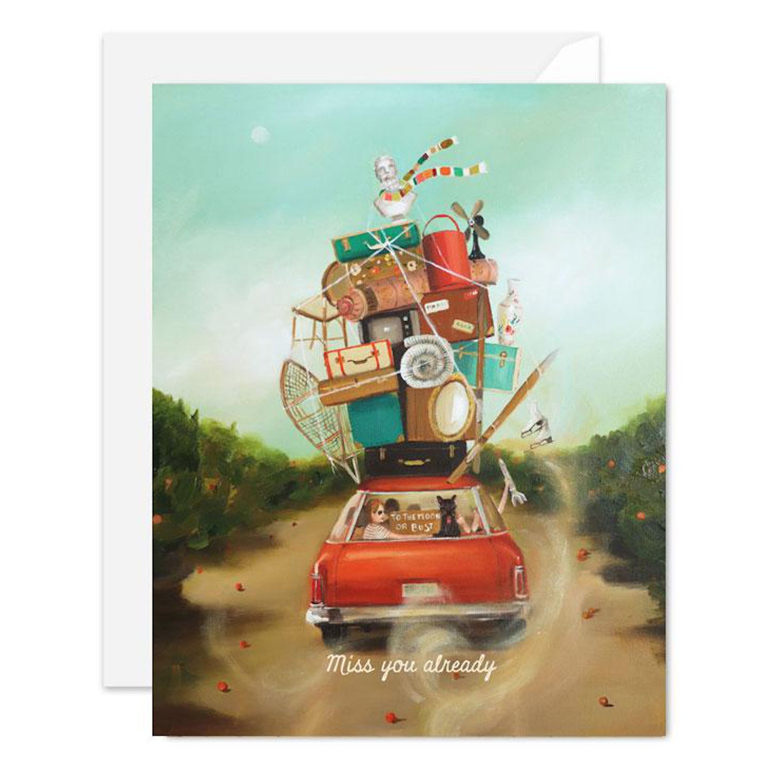 An illustration of a car packed with belongings and people, on a journey, featuring the Miss You Already Card at the bottom. This card showcases Janet Hill&