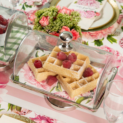 A showcase table setting featuring the Aluminum and Glass Serving Stand &amp; Dome by Hester &amp; Cook, waffles, and raspberries.
