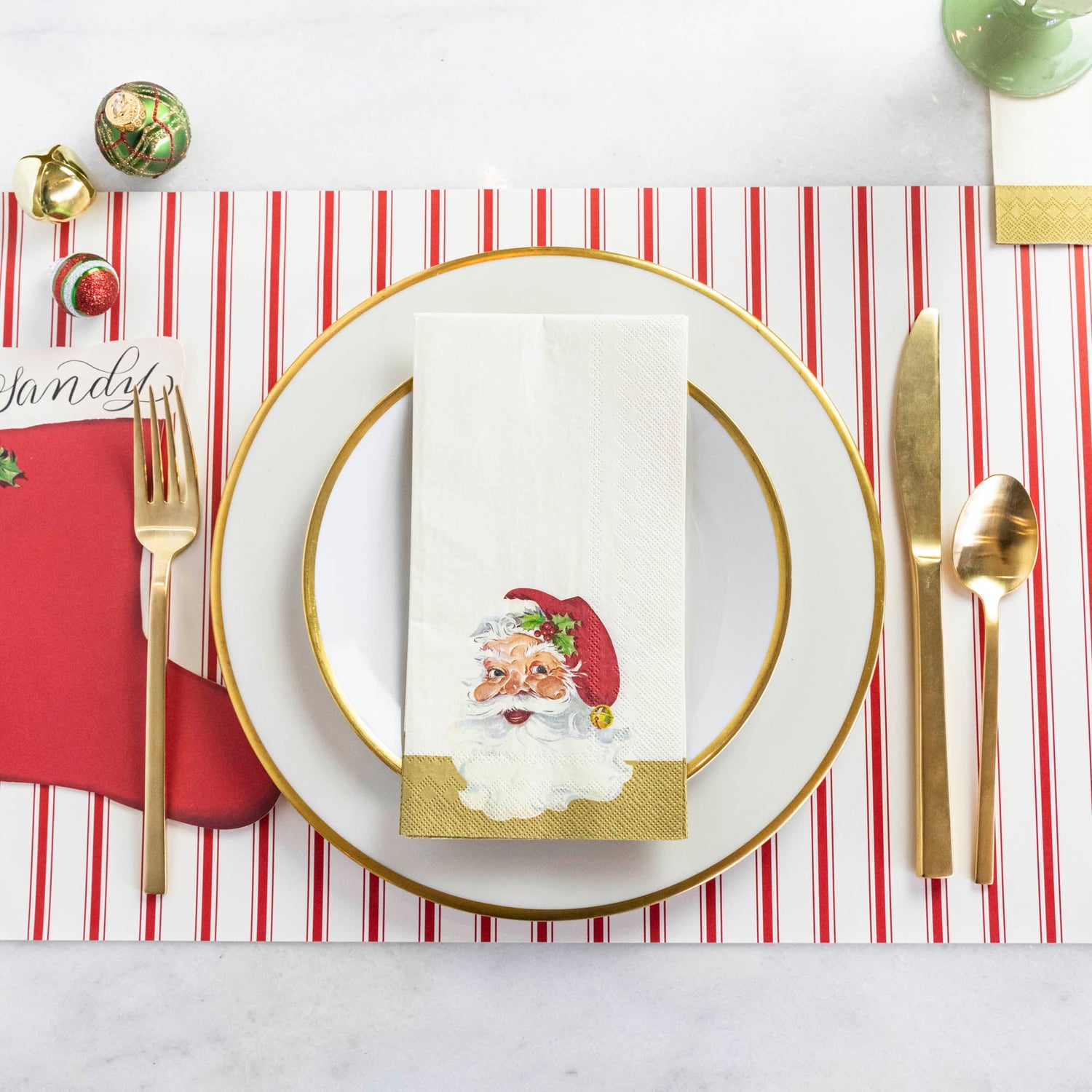 Hester &amp; Cook Santa Napkins table setting with holiday cheer.