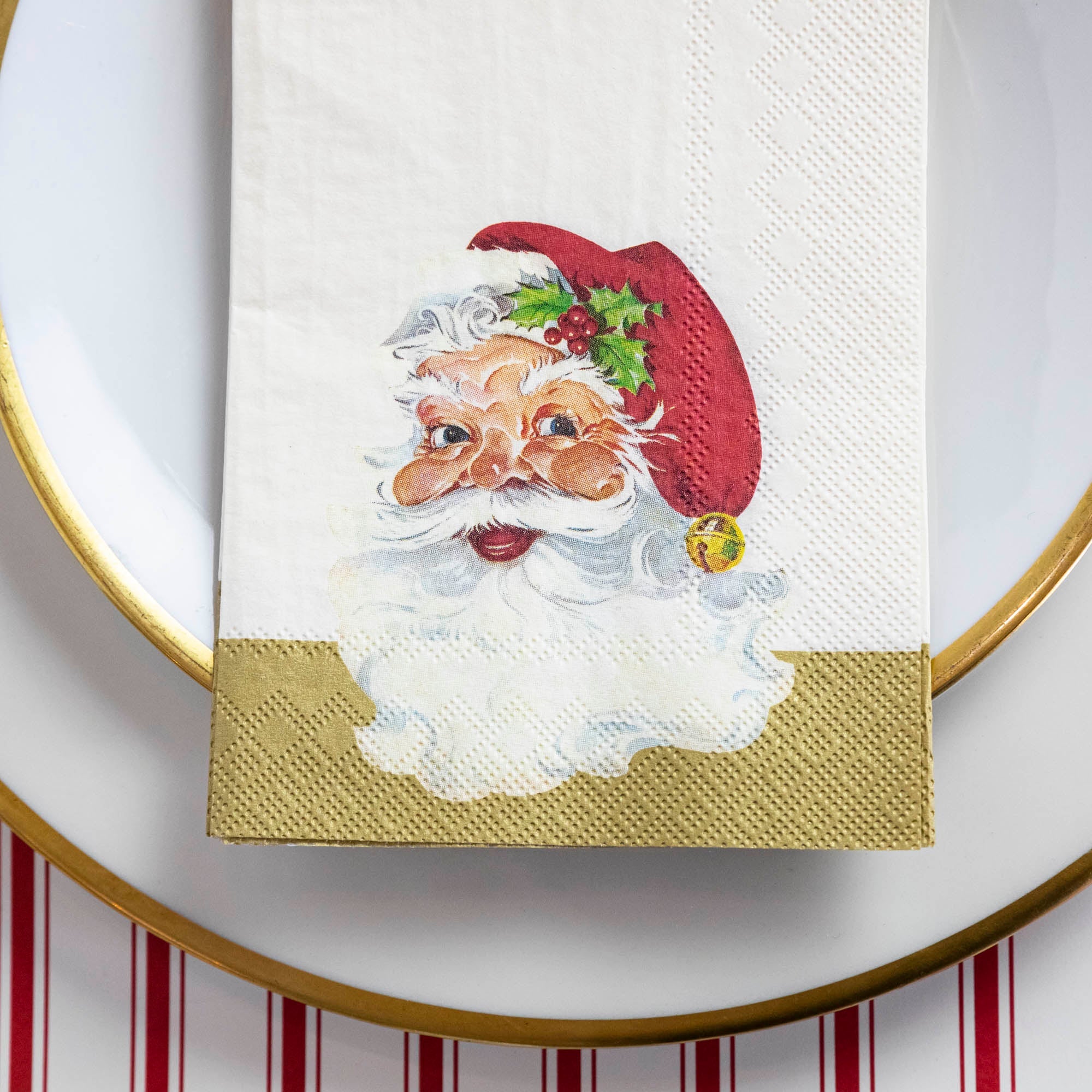 A festive Hester &amp; Cook Santa Napkin, perfect for adding holiday cheer to your table setting.