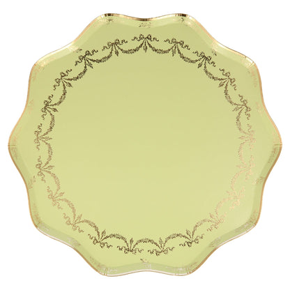 An ornate Ladurée Paris Paper Plate with gold trim, perfect for elegant dining, by Meri Meri.