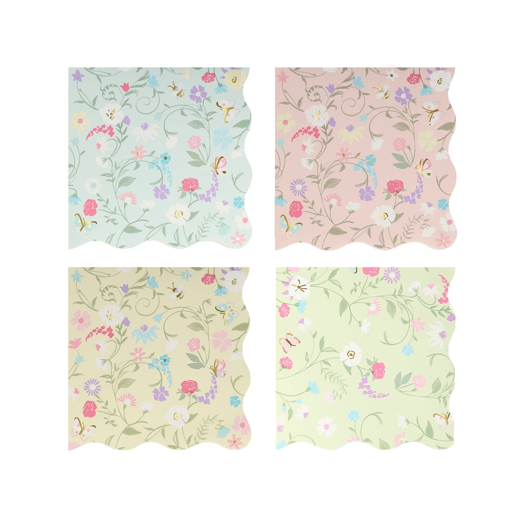 A set of four Meri Meri Ladurée Floral Small Napkins with scalloped borders and flowers on them.